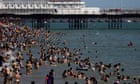 UK weather: thunderstorm warnings in north and 34C predicted in south-east