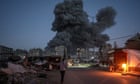 At least 27 killed in Israeli bombing of shelter in Gaza City, rescuers say