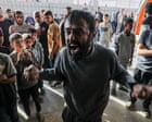 Palestinians gunned down while trying to reach food aid site in Gaza, hospital says