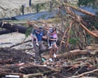 Texas continues grim flood recovery with at least 50 killed, including 15 children