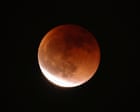 Blood moon and lunar eclipse cast an ethereal light – in pictures