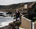 ‘It’s not just our houses’: can a Scottish village save Queen Elizabeth’s coastal path from the waves?