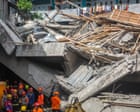 Indonesia school collapse: one dead, 65 buried under rubble as rescuers race to find survivors