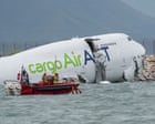 Hong Kong: two people reported killed after cargo plane skids off airport runway