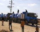 Israel limits aid into Gaza in dispute over hostage remains as ceasefire faces test