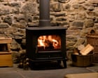 Wood-burning stoves to face partial ban in Labour’s updated environment plan