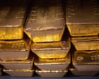 Gold price tops $5,000 an ounce for first time as investors seek safe haven from Trump turmoil