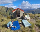 ‘Leave things better than you find them’: the volunteer army cleaning New Zealand’s remote hiking huts