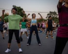 ‘There’s more to life than work’: Bangkok’s young people embrace mass outdoor aerobics sessions